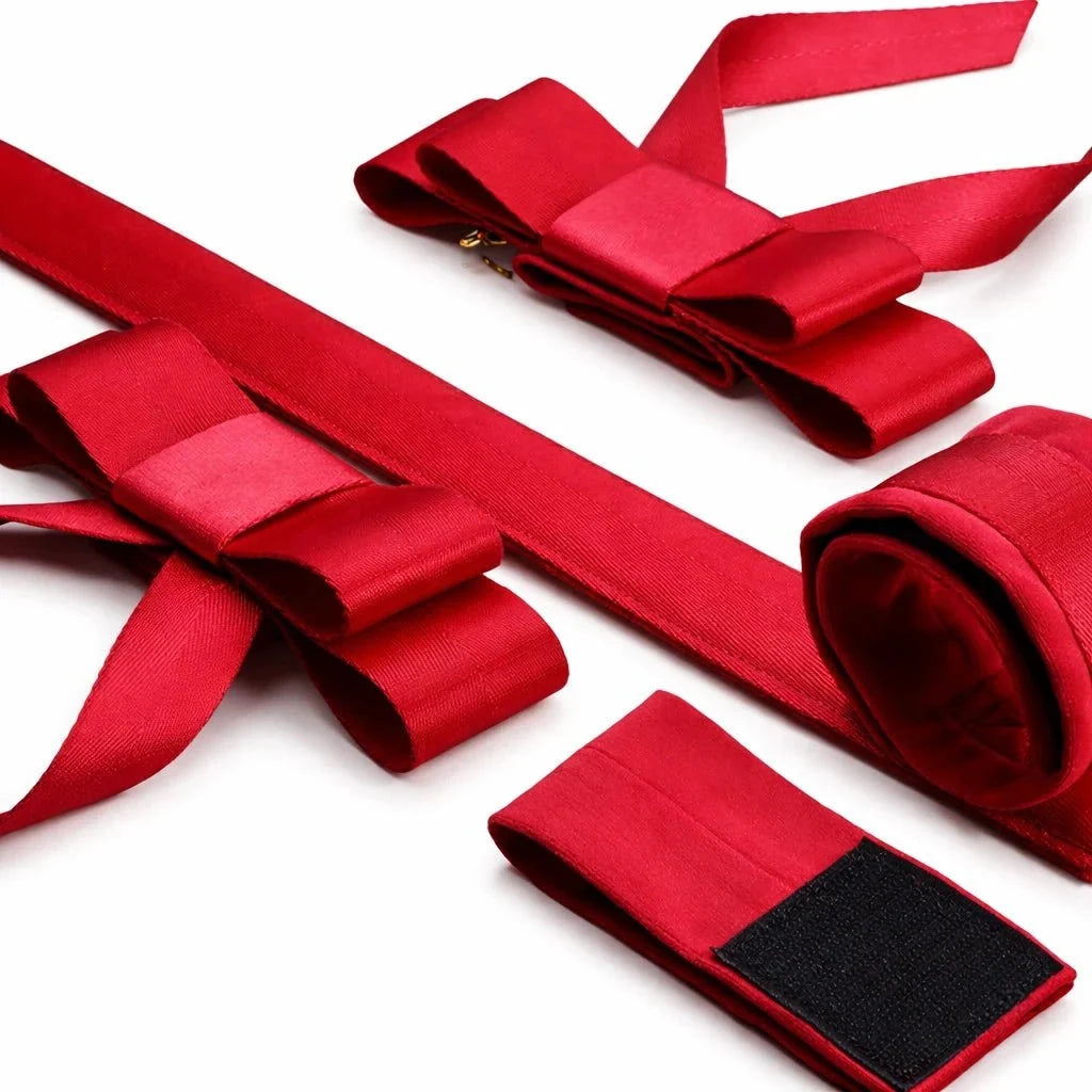 Red Ribbon Spreader Bar Bondage Set Detail shot — Marquis de Mayfair