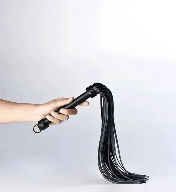 Paradise Regained: Leather Fringe Flogger In use — Marquis de Mayfair